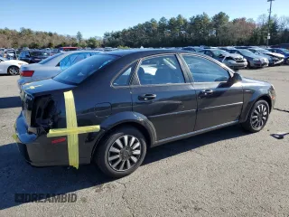 2006 Suzuki Forenza z VIN KL5JD56ZX6K278029, wystawiony jako Copart lot #82026904 z przebiegiem 117 700 mil mil oraz Szkody całkowita. Historia ofert i sprzedaży dostępna na DreamBid. Obrazek 3.