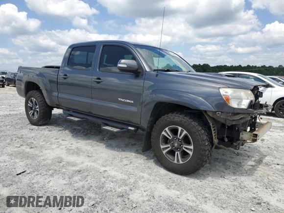 2015 Toyota Tacoma with VIN 3TMMU4FN1FM073755, listed as a Copart auction lot 59657105 with 114,193 mi miles and Salvage title. Bid and sale history available at DreamBid. Image 4.