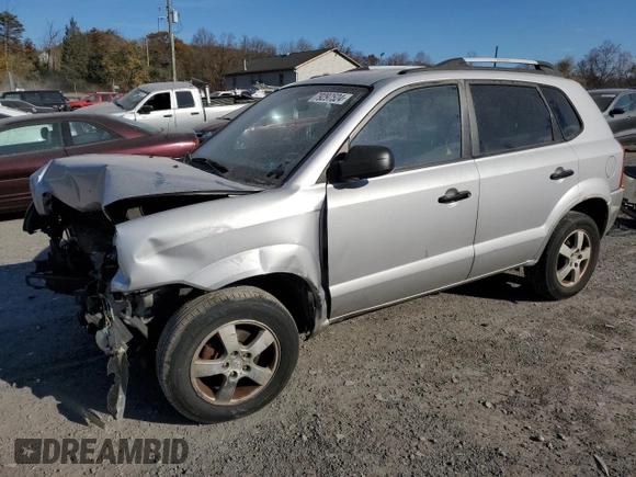 2005 Hyundai Tucson GL with VIN KM8JM12B95U067091, listed as a Copart auction lot 79297524 with Not Provided miles and Salvage Title. Bid and sale history available at carsss.com. Image 1.