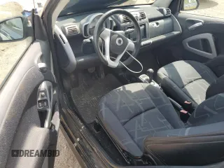 2009 Smart fortwo Pure with VIN WMEEJ31X59K218003, listed as a Copart auction lot 62413775 with 82,711 mi miles and Salvage title. Bid and sale history available at DreamBid. Image 8.