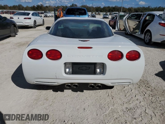 1999 Chevrolet Corvette with VIN 1G1YY22G6X5117332, listed as a Copart auction lot 77683134 with 0 mi miles and Salvage Title. Bid and sale history available at carsss.com. Image 6.
