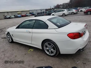2015 BMW 4 Series 428i xDrive with VIN WBA3T1C52FP819767, listed as a Copart auction lot 82695004 with 71,648 mi miles and Salvage Title. Bid and sale history available at carsss.com. Image 2.