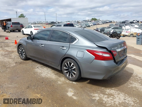 2018 Nissan Altima S with VIN 1N4AL3APXJC122072, listed as a IAAI auction lot 41749875 with 184,127 mi miles and . Bid and sale history available at DreamBid. Image 3.