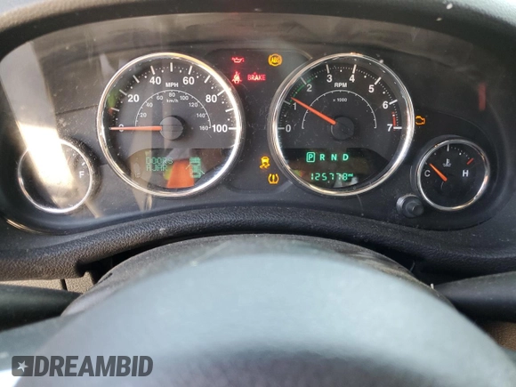 2015 Jeep Wrangler Unlimited Freedom with VIN 1C4HJWDG0FL598947, listed as a Copart auction lot 61794214 with 125,778 mi miles and Salvage title. Bid and sale history available at DreamBid. Image 9.