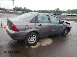 2007 Ford Focus S z VIN 1FAHP34N07W177912, wystawiony jako Copart lot #60481025 z przebiegiem 114 086 mil mil oraz Szkoda całkowita • Salvage title. Historia ofert i sprzedaży dostępna na DreamBid. Obrazek 3.