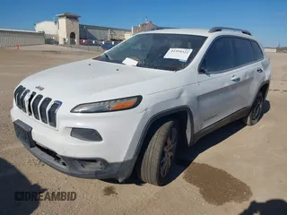 2014 Jeep Cherokee Limited with VIN 1C4PJLDSXEW118473, listed as a IAAI auction lot 41359322 with 111,000 mi miles. Bid and sale history available at carsss.com. Image 2.