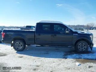 2015 Ford F-150 XLT w/HD Payload Pkg with VIN 1FTFW1EF6FFC08787, listed as a IAAI auction lot 41290445 with 136,293 mi miles. Bid and sale history available at carsss.com. Image 14.