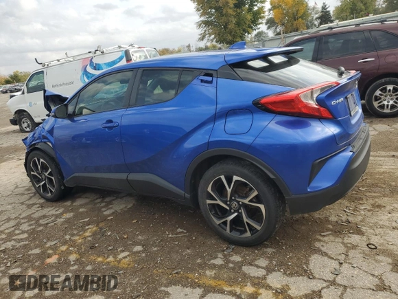 2021 Toyota C-HR LE with VIN JTNKHMBX2M1107890, listed as a Copart auction lot 77992554 with 54,219 mi miles and Salvage Title. Bid and sale history available at carsss.com. Image 2.