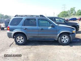 2005 Ford Escape XLT z VIN 1FMCU931X5KD62886, wystawiony jako IAAI lot #42564007 z przebiegiem 134 080 mil mil oraz . Historia ofert i sprzedaży dostępna na DreamBid. Obrazek 13.