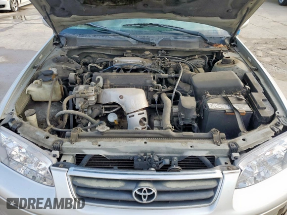 2001 Toyota Camry CE z VIN 4T1BG22K01U085409, wystawiony jako Copart lot #55941765 z przebiegiem 215 062 mil mil oraz Szkoda całkowita • Salvage title. Historia ofert i sprzedaży dostępna na DreamBid. Obrazek 11.