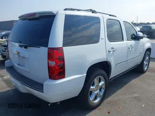 2013 Chevrolet Tahoe LTZ with VIN 1GNSKCE04DR374682, listed as a IAAI auction lot 42779526 with 139,533 mi miles and . Bid and sale history available at DreamBid. Image 4.