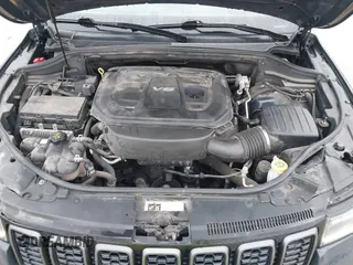 2018 Jeep Grand Cherokee Trailhawk with VIN 1C4RJFLG6JC320763, listed as a IAAI auction lot 41871683 with 115,417 mi miles and . Bid and sale history available at DreamBid. Image 10.