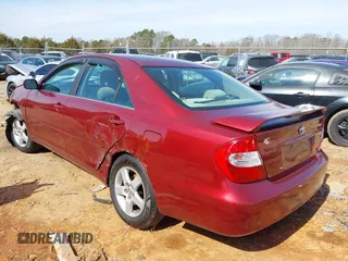 2002 Toyota Camry XLE z VIN 4T1BF32K02U006928, wystawiony jako IAAI lot #41569825 z przebiegiem 188 482 mil mil oraz . Historia ofert i sprzedaży dostępna na DreamBid. Obrazek 3.