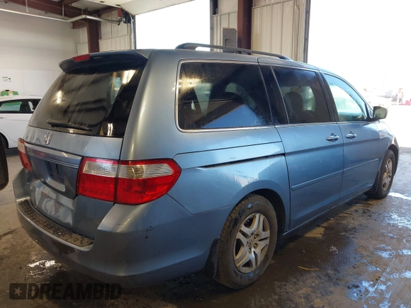 2007 Honda Odyssey EX-L z VIN 5FNRL38617B078923, wystawiony jako IAAI lot #42335122 z przebiegiem 154 352 mil mil oraz . Historia ofert i sprzedaży dostępna na DreamBid. Obrazek 4.