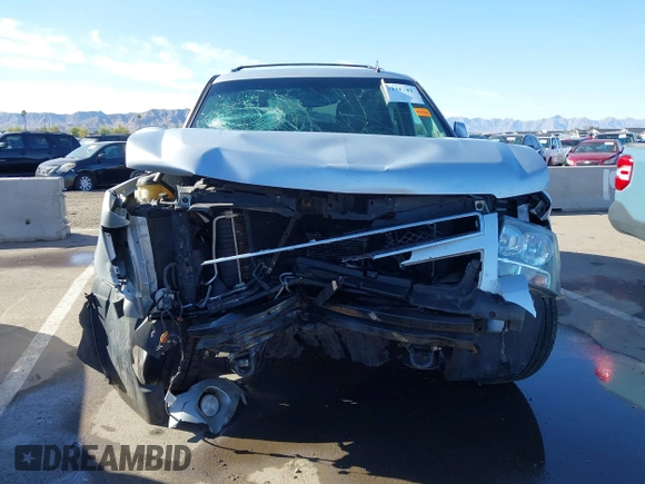 2013 Chevrolet Tahoe LT with VIN 1GNSKBE01DR157083, listed as a IAAI auction lot 41759189 with 153,403 mi miles and . Bid and sale history available at DreamBid. Image 6.