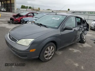 2005 Ford Focus S z VIN 3FAFP37N75R120187, wystawiony jako Copart lot #57390605 z przebiegiem 163 547 mil mil oraz Szkoda całkowita • Salvage title. Historia ofert i sprzedaży dostępna na DreamBid. Obrazek 1.