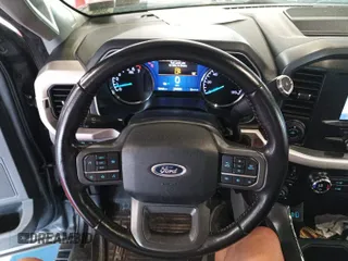 2021 Ford F-150 XL with VIN 1FTFW1E81MKE96112, listed as a IAAI auction lot 42788387 with 101,494 mi miles and . Bid and sale history available at DreamBid. Image 21.