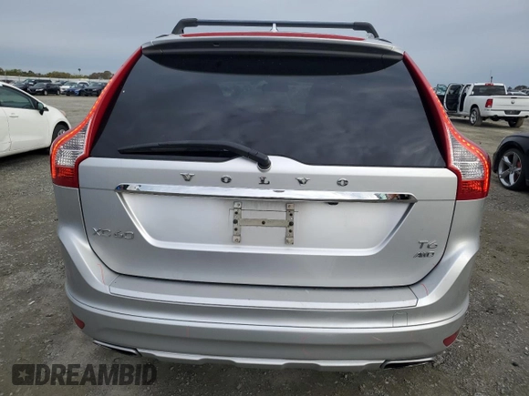 2014 Volvo XC60 R-Design Premier Plus z VIN YV4902DZ1E2501709, wystawiony jako Copart lot #50072525 z przebiegiem 125 351 mil mil oraz Szkoda całkowita • Salvage title. Historia ofert i sprzedaży dostępna na DreamBid. Obrazek 6.