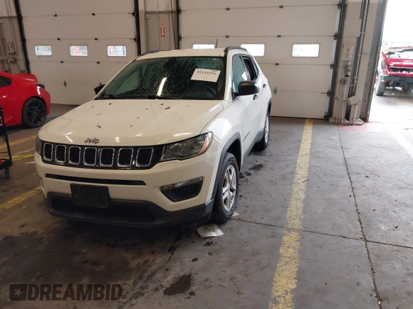 2018 Jeep Compass Sport with VIN 3C4NJCAB6JT124198, listed as a IAAI auction lot 41192196 with 104,557 mi miles. Bid and sale history available at carsss.com. Image 22.