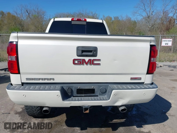 2014 GMC Sierra 1500 SLT with VIN 3GTU2VEC0EG208569, listed as a IAAI auction lot 41834893 with 128,731 mi miles and . Bid and sale history available at DreamBid. Image 16.