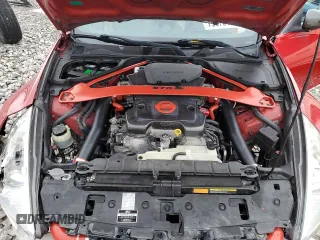 2009 Nissan 370Z z VIN JN1AZ44E19M400603, wystawiony jako Copart lot #79878474 z przebiegiem 129 976 mil mil oraz Szkoda całkowita • Salvage title. Historia ofert i sprzedaży dostępna na DreamBid. Obrazek 11.