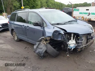 2014 Toyota Sienna LE with VIN 5TDJK3DC1ES082653, listed as a IAAI auction lot 42594632 with 186,392 mi miles and . Bid and sale history available at DreamBid. Image 1.
