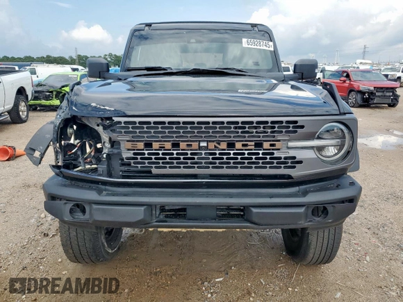 2021 Ford Bronco с VIN 1FMEE5DP8MLB02805, выставлен на аукционе Copart как лот 65928745 с пробегом 52 200 миль миль и Списание • Salvage title. История ставок и продаж доступна на DreamBid. Изображение 5.