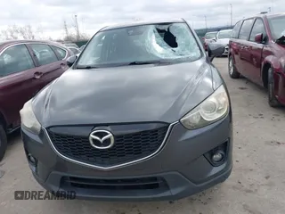2015 Mazda CX-5 Grand Touring with VIN JM3KE4DY0F0479229, listed as a IAAI auction lot 41838381 with 139,843 mi miles. Bid and sale history available at carsss.com. Image 12.