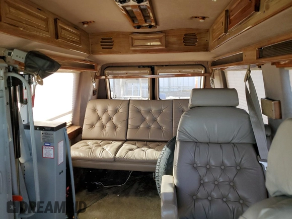 1995 Chevrolet Chevy Van z VIN 1GBEG25K3SF249372, wystawiony jako Copart lot #72284224 z przebiegiem 72 331 mil mil oraz Tytuł czysty. Historia ofert i sprzedaży dostępna na DreamBid. Obrazek 10.