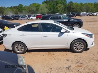 2021 Hyundai Accent SE with VIN 3KPC24A65ME137479, listed as a IAAI auction lot 41951290 with 32,636 mi miles and . Bid and sale history available at DreamBid. Image 14.