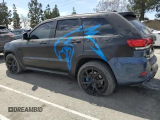 2020 Jeep Grand Cherokee Trackhawk z VIN 1C4RJFN94LC314087, wystawiony jako Copart lot #51484835 z przebiegiem 38 306 mil mil oraz Szkoda całkowita • Salvage title. Historia ofert i sprzedaży dostępna na DreamBid. Obrazek 2.