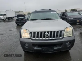 2002 Mercury Mountaineer z VIN 4M2DU66E12ZJ34780, wystawiony jako Copart lot #42529655 z przebiegiem 142 723 mil mil oraz Szkoda całkowita • Salvage title. Historia ofert i sprzedaży dostępna na DreamBid. Obrazek 5.