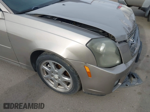 2003 Cadillac CTS with VIN 1G6DM57N730116792, listed as a IAAI auction lot 41686845 with 121,590 mi miles. Bid and sale history available at carsss.com. Image 12.