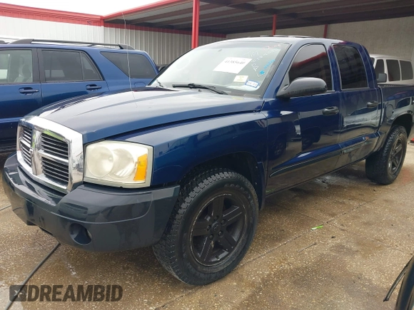 2007 Dodge Dakota SLT with VIN 1D7HE48K07S137252, listed as a IAAI auction lot 41385640 with 223,920 mi miles and . Bid and sale history available at carsss.com. Image 2.