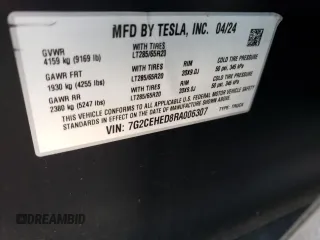 2024 Tesla Cybertruck z VIN 7G2CEHED8RA006307, wystawiony jako Copart lot #74118474 z przebiegiem 1773 mil mil oraz Szkody całkowita. Historia ofert i sprzedaży dostępna na DreamBid. Obrazek 14.