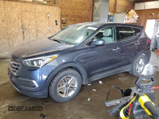 2018 Hyundai Santa Fe 2.4L with VIN 5NMZTDLB4JH073800, listed as a Copart auction lot 63575485 with 128,063 mi miles and Salvage title. Bid and sale history available at DreamBid. Image 1.
