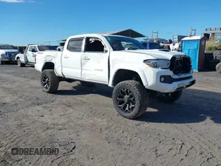 2018 Toyota Tacoma SR5 with VIN 3TMDZ5BN7JM037641, listed as a IAAI auction lot 40901641 with 95,278 mi miles and . Bid and sale history available at DreamBid. Image 1.