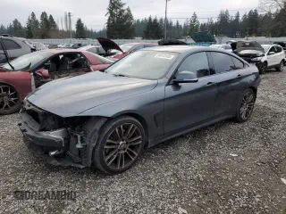 2015 BMW 4 Series 428i z VIN WBA4A9C57FGL85533, wystawiony jako Copart lot #88518165 z przebiegiem 77 768 mil mil oraz Szkoda całkowita • Salvage title. Historia ofert i sprzedaży dostępna na DreamBid. Obrazek 1.