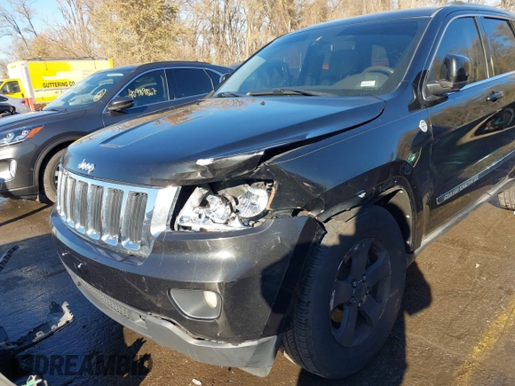 2011 Jeep Grand Cherokee 70th Anniversary with VIN 1J4RR4GT8BC504618, listed as a IAAI auction lot 40993960 with 188,098 mi miles. Bid and sale history available at carsss.com. Image 6.