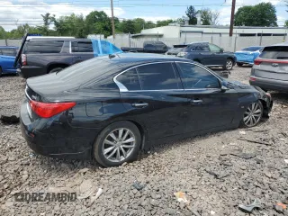 2015 Infiniti Q50 Premium z VIN JN1BV7ARXFM409465, wystawiony jako Copart lot #57295785 z przebiegiem 144 328 mil mil oraz Szkoda całkowita • Salvage title. Historia ofert i sprzedaży dostępna na DreamBid. Obrazek 3.