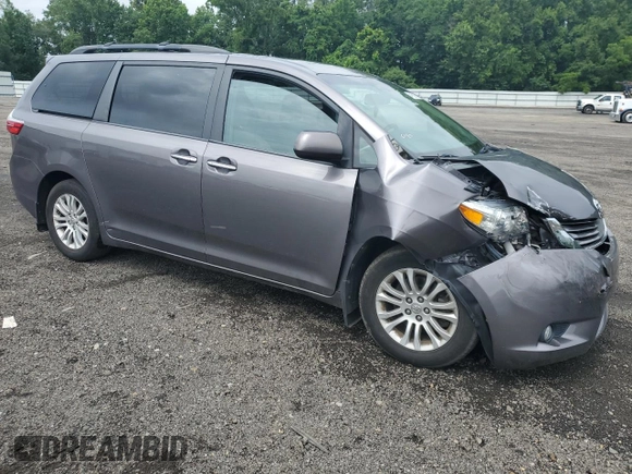 2015 Toyota Sienna XLE z VIN 5TDYK3DC1FS574647, wystawiony jako Copart lot #64163905 z przebiegiem 144 403 mil mil oraz Szkoda całkowita • Salvage title. Historia ofert i sprzedaży dostępna na DreamBid. Obrazek 4.