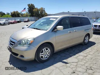 2005 Honda Odyssey EX-L z VIN 5FNRL38625B045152, wystawiony jako Copart lot #57633005 z przebiegiem 145 776 mil mil oraz Szkoda całkowita • Salvage title. Historia ofert i sprzedaży dostępna na DreamBid. Obrazek 1.
