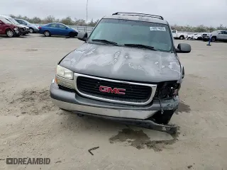 2002 GMC Yukon SLE with VIN 1GKEC13V52J192656, listed as a Copart auction lot 46674605 with 258,336 mi miles and Salvage Title. Bid and sale history available at carsss.com. Image 12.