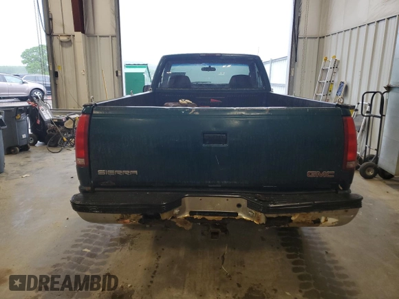 1998 GMC Sierra 1500 with VIN 1GTEK14M1WZ516360, listed as a Copart auction lot 58415935 with 81,043 mi miles and Clean title. Bid and sale history available at DreamBid. Image 6.