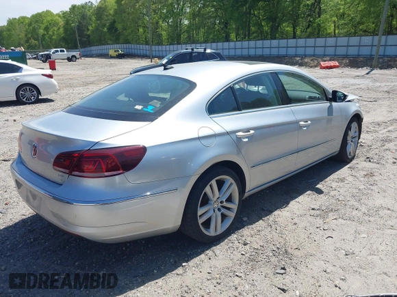 2014 Volkswagen CC Lux with VIN WVWRP7AN9EE504627, listed as a IAAI auction lot 42044187 with 114,153 mi miles and . Bid and sale history available at DreamBid. Image 4.