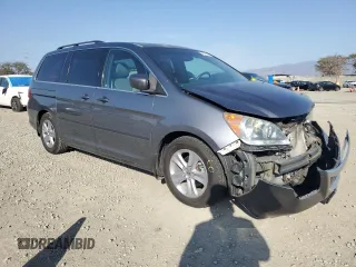 2010 Honda Odyssey Touring with VIN 5FNRL3H98AB053468, listed as a Copart auction lot 45524345 with 156,424 mi miles and Salvage Title. Bid and sale history available at carsss.com. Image 4.