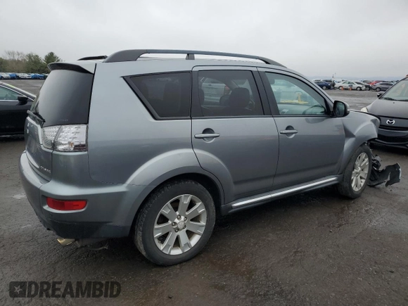 2013 Mitsubishi Outlander SE z VIN JA4JT3AW4DU000656, wystawiony jako Copart lot #51808395 z przebiegiem 158 479 mil mil oraz Szkoda całkowita • Salvage title. Historia ofert i sprzedaży dostępna na DreamBid. Obrazek 3.