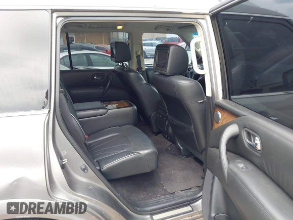 2013 Infiniti QX56 with VIN JN8AZ2NEXD9060450, listed as a IAAI auction lot 42388986 with 124,129 mi miles and . Bid and sale history available at DreamBid. Image 8.