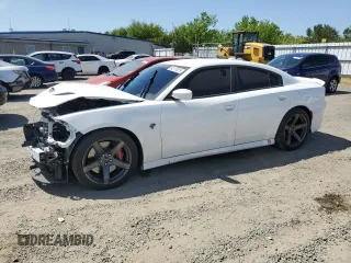 2019 Dodge Charger SRT Hellcat z VIN 2C3CDXL96KH605468, wystawiony jako Copart lot #54217815 z przebiegiem 33 555 mil mil oraz Szkody całkowita. Historia ofert i sprzedaży dostępna na DreamBid. Obrazek 1.