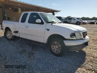2003 Ford F-150 XL with VIN 1FTRX07W03KD12910, listed as a Copart auction lot 57864555 with Not provided miles and Salvage title. Bid and sale history available at DreamBid. Image 4.